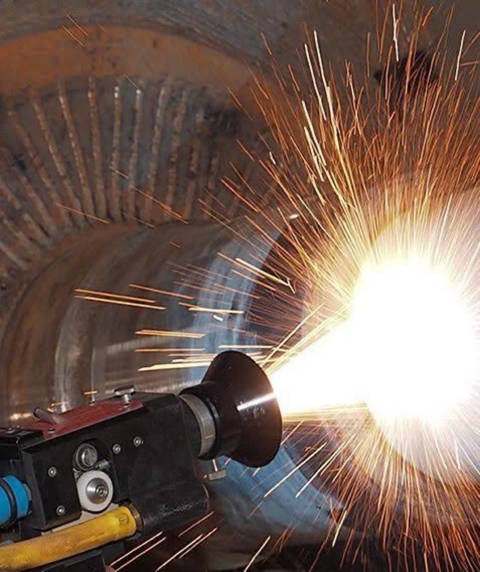 Metal spraying at Metalspray Engineering with a shower of sparks